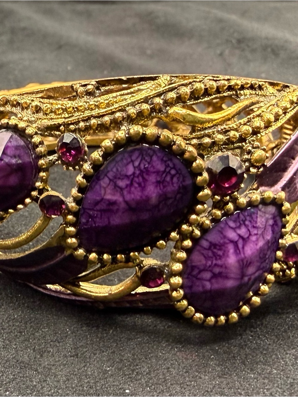 Gold-Tone Bracelet with Purple Cabochon Stones by